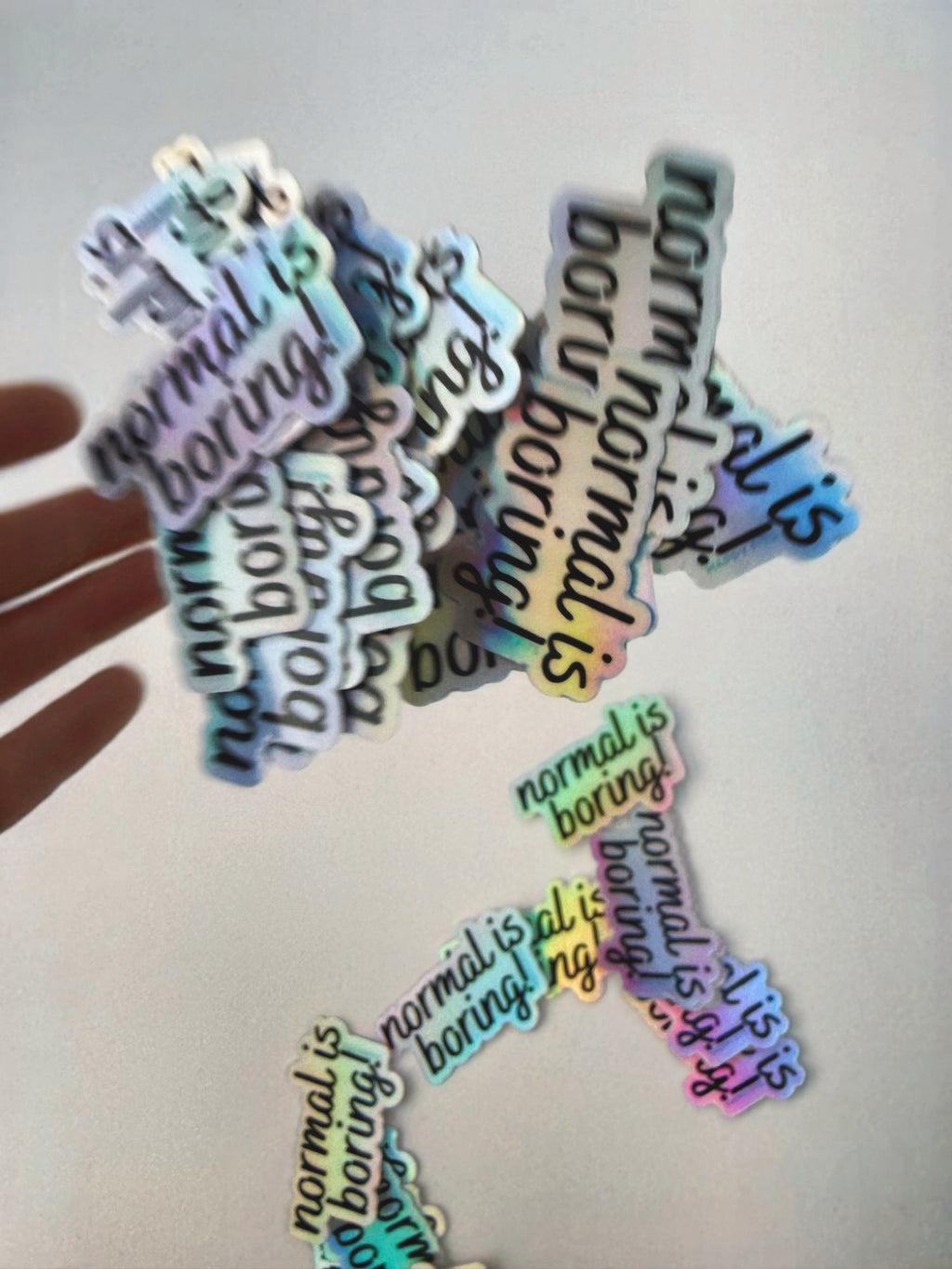 normal is boring! holographic sticker